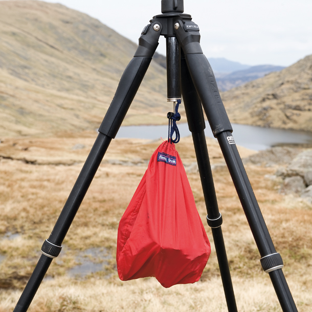 A weighted bag helps hold a sturdy Gitzo tripod in place. Credit: DPReview