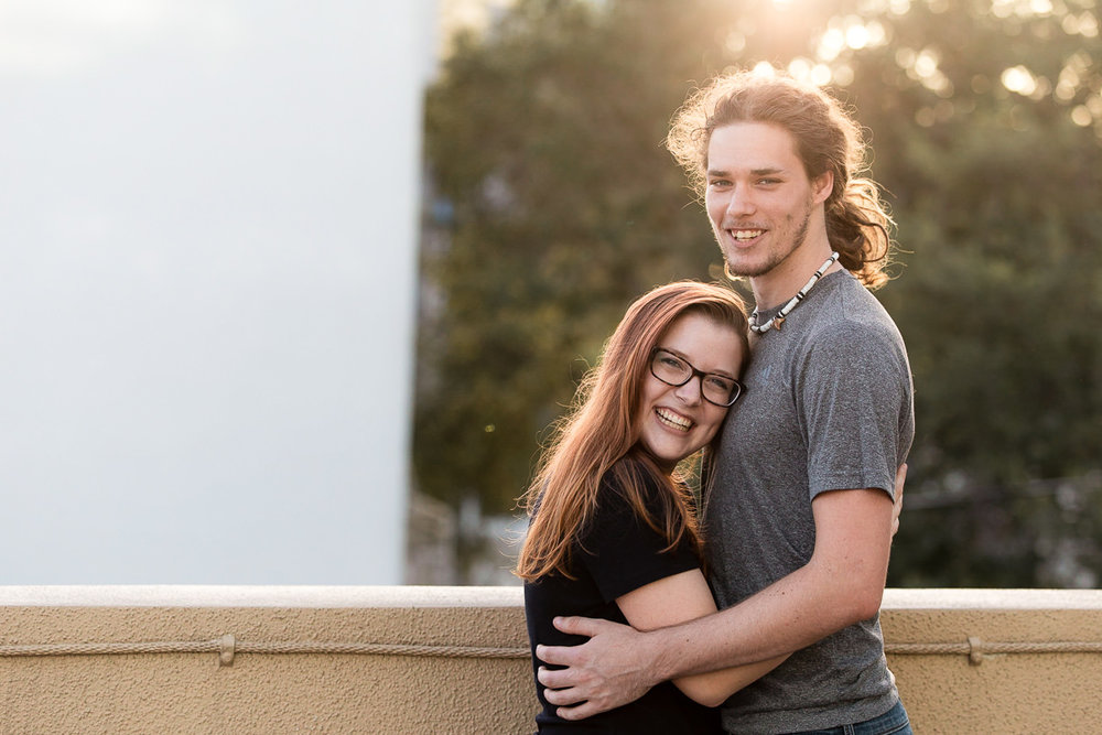 Engaged couple at sunset in downtown St. Petersburg, Florida