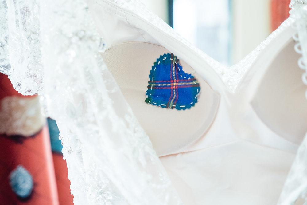Special heart patch sewn into the wedding dress of a bride getting ready at The Hollander Hotel in St. Petersburg, Florida