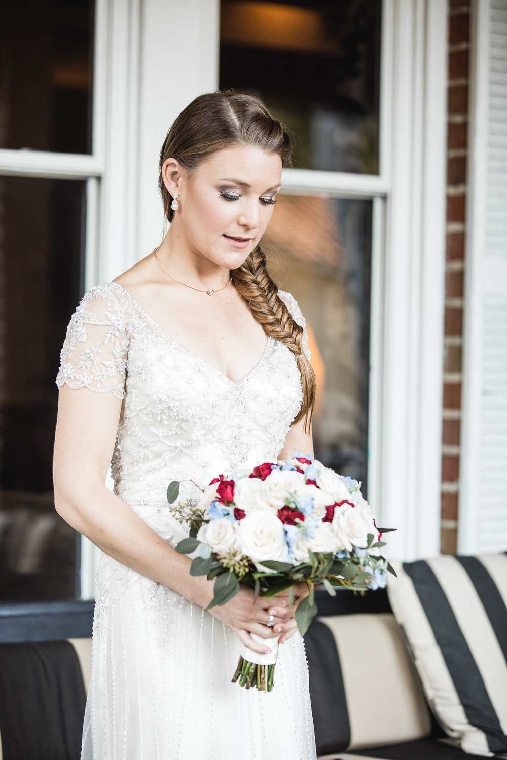 Photograph of bride in thought at The Hollander Hotel in St. Petersburg, Florida 
