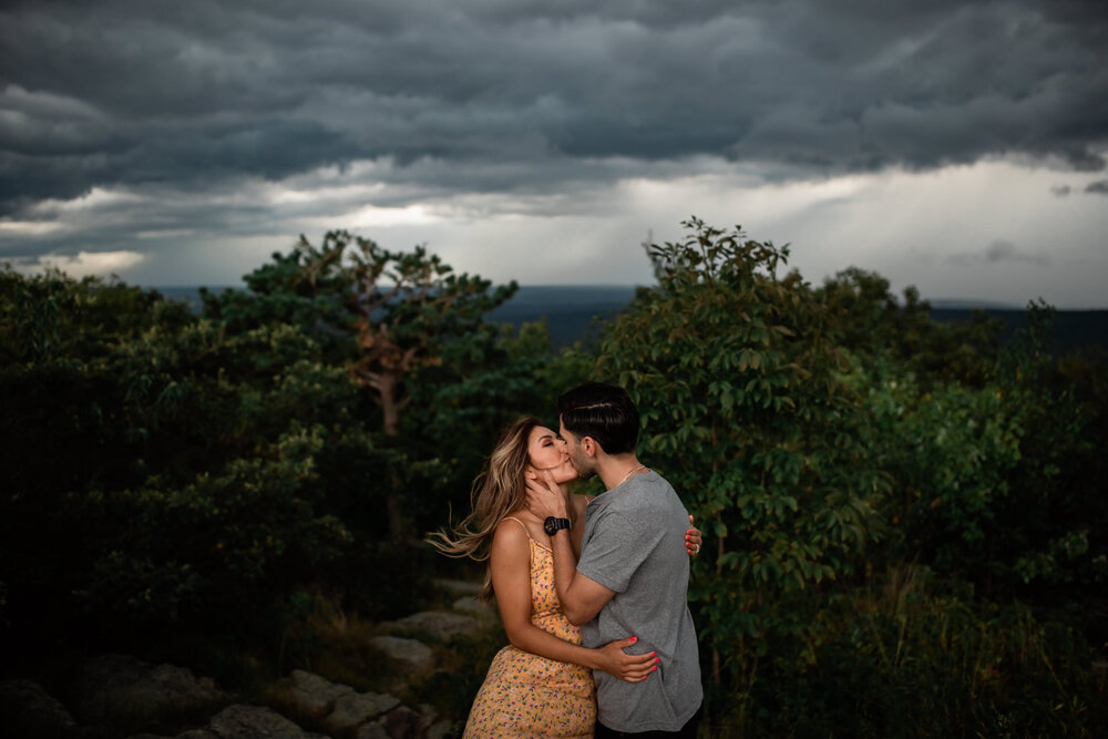 New Jersey Wedding Photographer, NJ Engagement Photographer, New Jersey Engagement Photographer, NJ Wedding Photographer, Sunset Trail Engagement Photographer, Engagement Session in NJ, New Jersey Engagement Sessions, Engagement Session in New Jersey, Engagement Photography, Engagement Inspiration, Wedding Planning, Wedding Ideas, Unique Engagement Photos, Engagement Session Photo Ideas, Fun Engagement Photos, Couple kissing during storm, Dramatic Sky, Wind blowing in hair