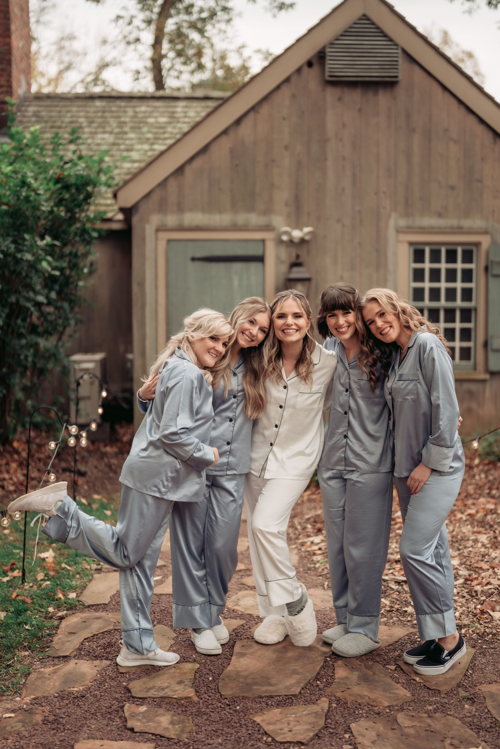 Waterloo Village Wedding, Waterloo Village Wedding Photographer, NJ Weddings, New Jersey Wedding Photographer, Rustic Fall New Jersey Wedding, NJ Wedding Photographer, Sussex County NJ  Photographer, New Jersey Wedding Venues, Sussex County Wedding Photography, Wedding Inspiration, Wedding Planning, Wedding Ideas, Unique Wedding Photos, Wedding Photo Ideas, bride and bridesmaids smiling for a group photo in their bluish gray matching pajamas before getting dressed 