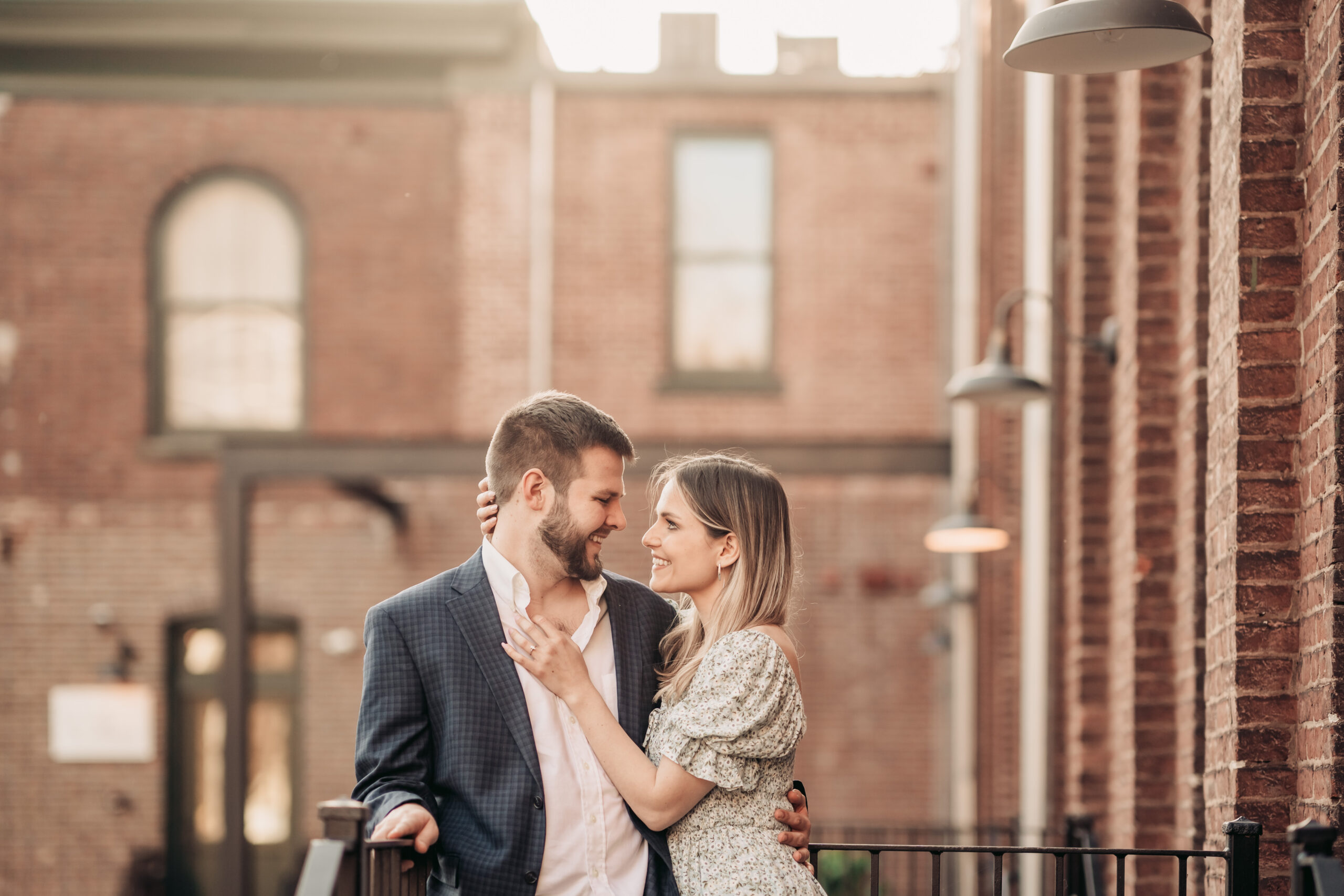 Easton Proposal, Easton Pennsylvania Proposal Photographer, PA Proposal Photographer, NJ Proposal Photographer, couple smiling and staring into each others eyes while woman holds man while showing her engagement ring
