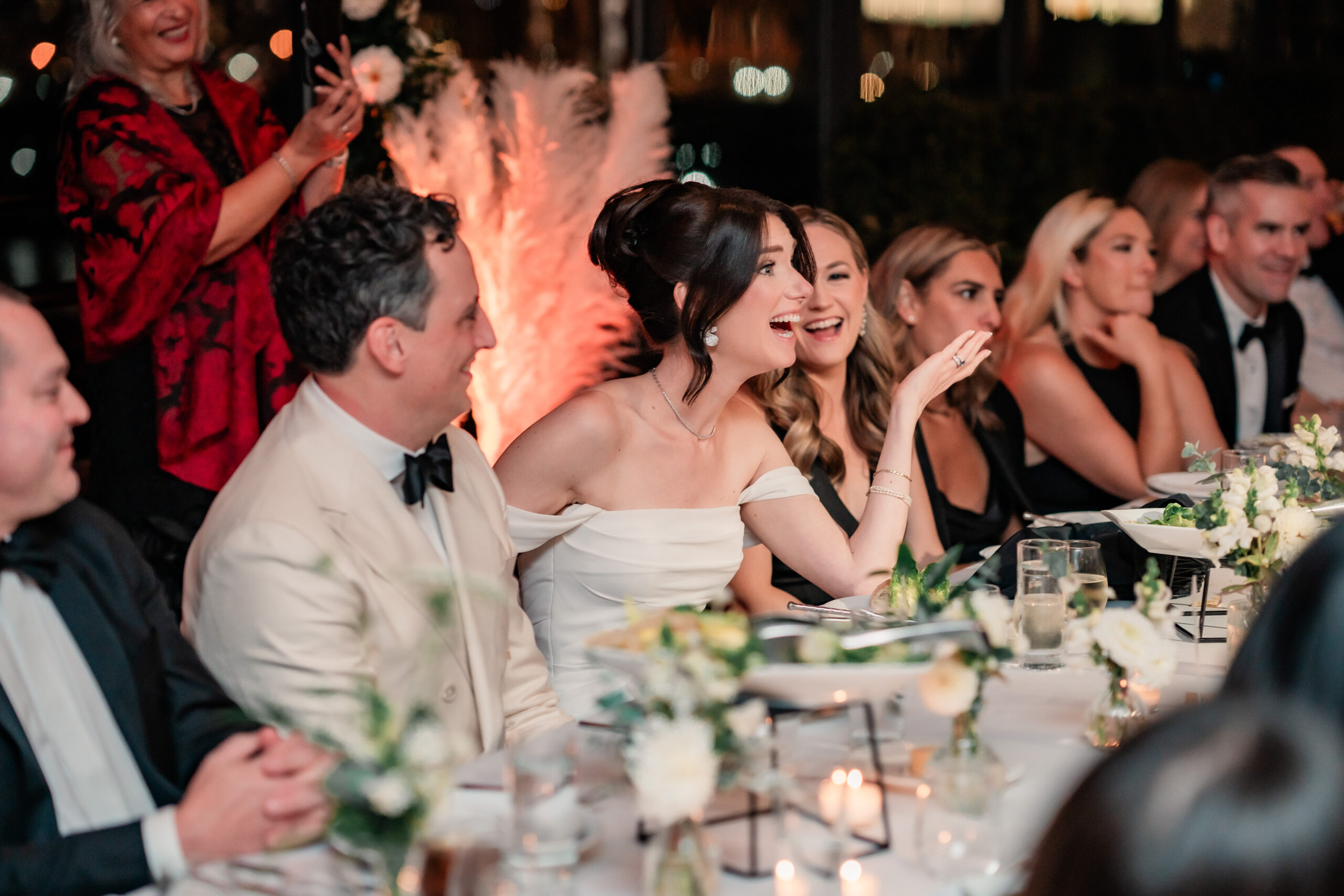 Box House Hotel Wedding, Brooklyn Wedding Photographer, NYC Wedding Photographer, NJ Wedding Photographer, Brooklyn Chic Wedding, Brooklyn Wedding Venue, NYC Wedding Venue, NYC Wedding, Disco Ball Wedding, Wedding Photo Inspiration, Wedding Photo Ideas, Cinematic Wedding Photography, Documentary Wedding Photography, candid photo of bride and groom laughing with friends at table during wedding reception toast